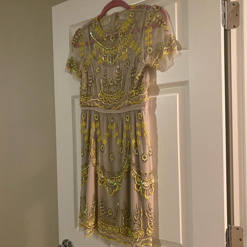 Gorgeous needle and thread dress